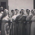 1950 circa - Maestranze della Manifattura Tabacchi - Donna con i fiori in mano la 'Maestra' Antonietta Noviello