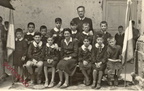 1950 circa Padre D'Onghia  fra gli studenti